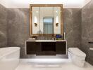 Modern elegant bathroom with large mirror and marble walls