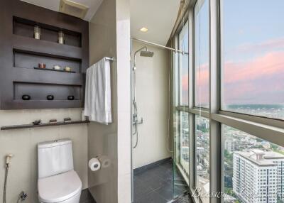 Modern high-rise bathroom with large windows