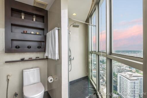 Modern high-rise bathroom with large windows