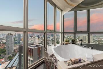 Luxurious Bathroom with City Skyline View