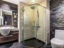 Modern bathroom with glass shower and stone accent wall