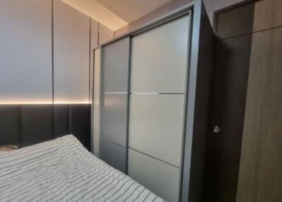Modern bedroom with large wardrobe