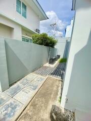 Clean and neat outdoor passage with greenery