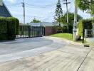 Entrance with gate and driveway