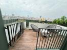 Outdoor balcony area with city views