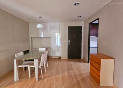 Modern dining area with table and chairs