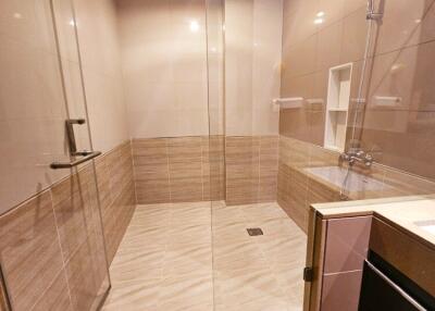 Modern bathroom with walk-in shower and sleek design