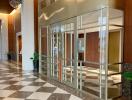 Spacious modern building lobby with checkered floor