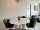 Elegant dining area with chandelier