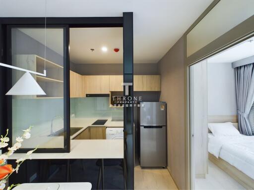 Modern kitchen with adjacent bedroom