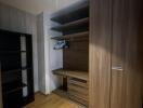 Spacious walk-in closet with shelving and hanging space