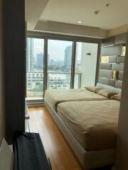 Modern bedroom with balcony view