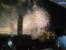 Night view of city skyline with fireworks