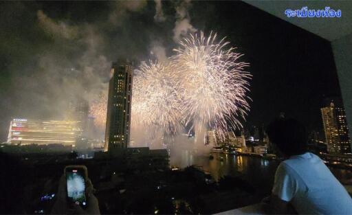 Night view of city skyline with fireworks