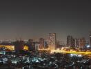 Night-time cityscape with illuminated buildings