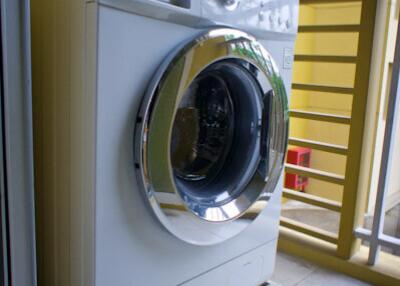 Washing machine in laundry area