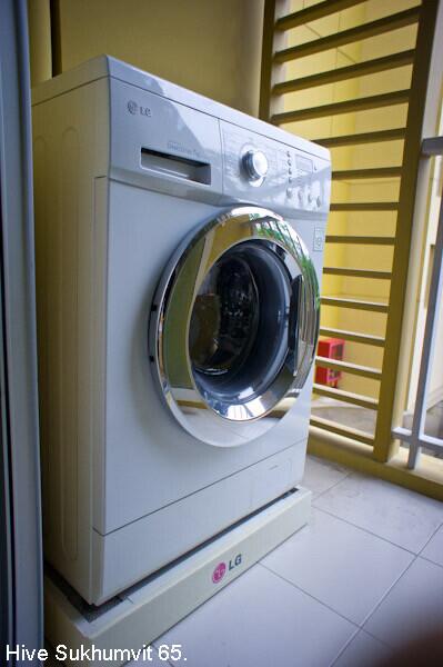 Washing machine in laundry area