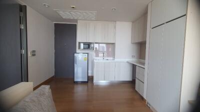 Modern kitchen with refrigerator and microwave