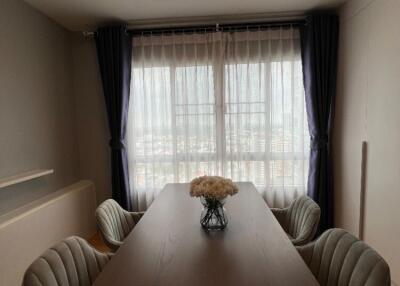 Dining room with a large table and chairs