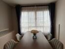 Dining room with a large table and chairs