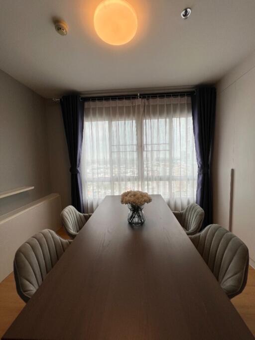 Dining room with a large table and chairs