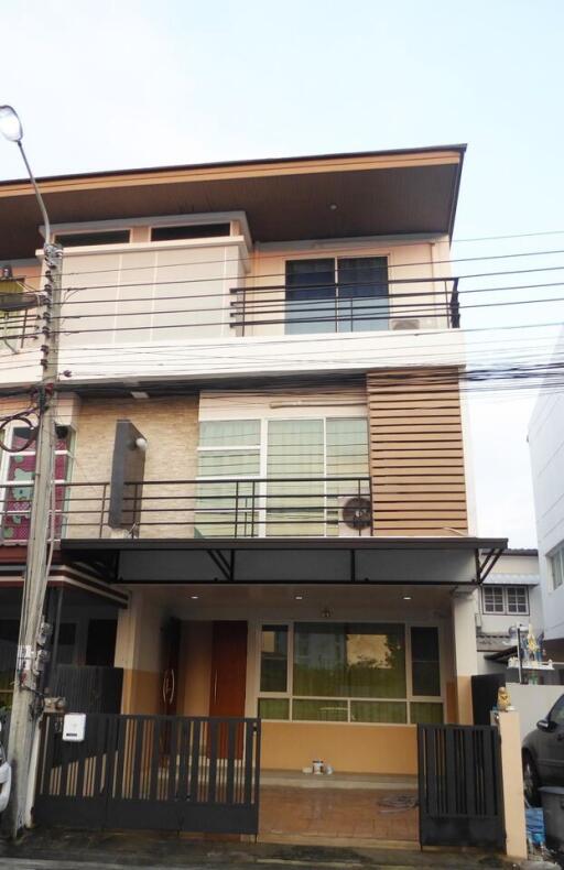 Exterior view of modern multi-story building with balconies