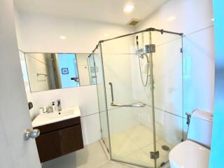 Modern bathroom with glass shower and fixtures