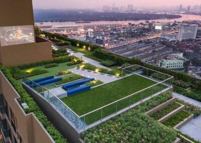 Rooftop garden with city view and outdoor lounge area