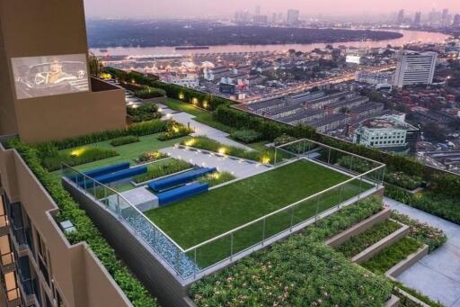 Rooftop garden with city view and outdoor lounge area