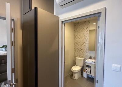 Bathroom view with modern fixtures and air conditioning unit