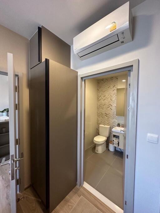 Bathroom view with modern fixtures and air conditioning unit