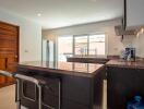 Modern kitchen with island and barstools