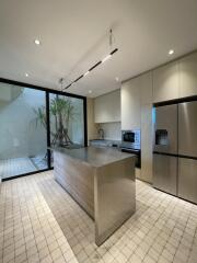 Modern kitchen with stainless steel island