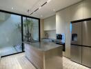 Modern kitchen with stainless steel island