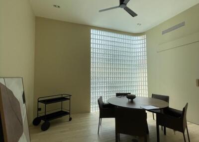 Minimalist dining room with modern furniture and natural light