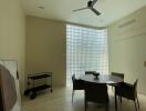 Minimalist dining room with modern furniture and natural light