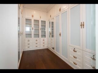 Spacious walk-in closet with ample storage