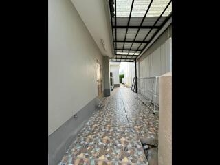 Outdoor walkway with tiled flooring