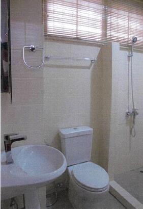 Bathroom with sink, toilet, and shower