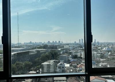 View from a building window overlooking the cityscape