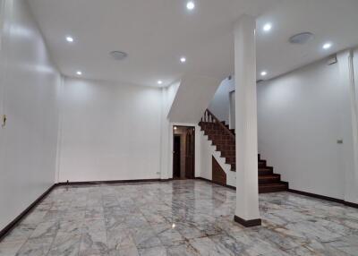 Spacious living area with staircase