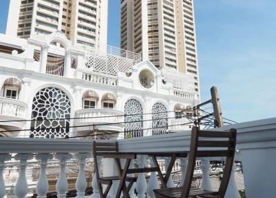 Balcony view with chairs and table