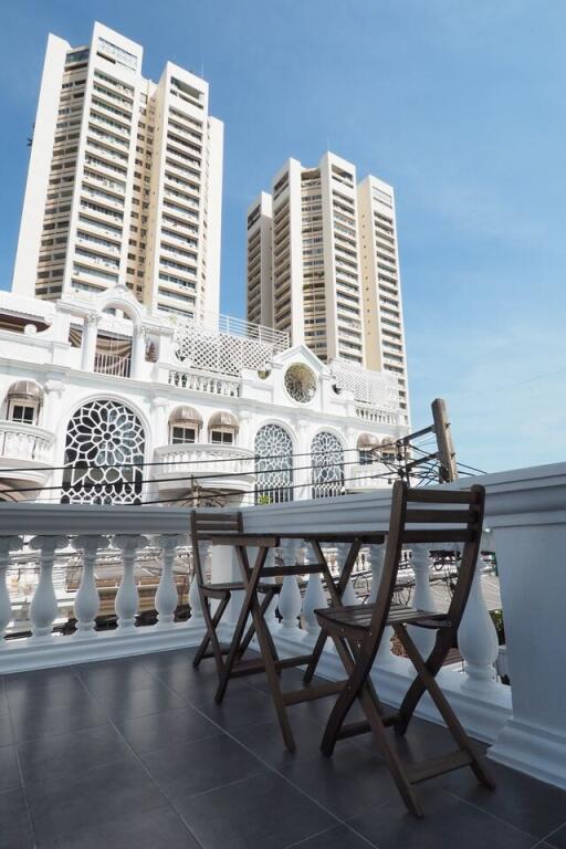 Balcony view with chairs and table