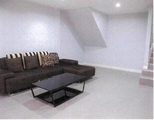 Modern living room with corner sofa and coffee table