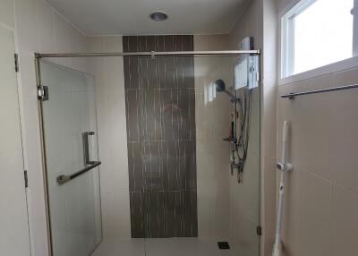 modern bathroom with glass shower enclosure