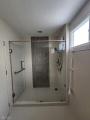 modern bathroom with glass shower enclosure