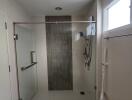 modern bathroom with glass shower enclosure