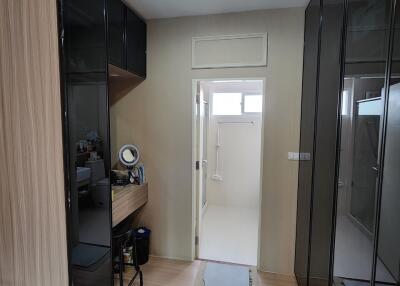 Modern bedroom with built-in wardrobes and ensuite bathroom