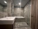 Modern bathroom with glass shower and bathtub