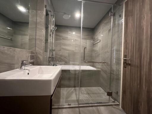 Modern bathroom with glass shower and bathtub